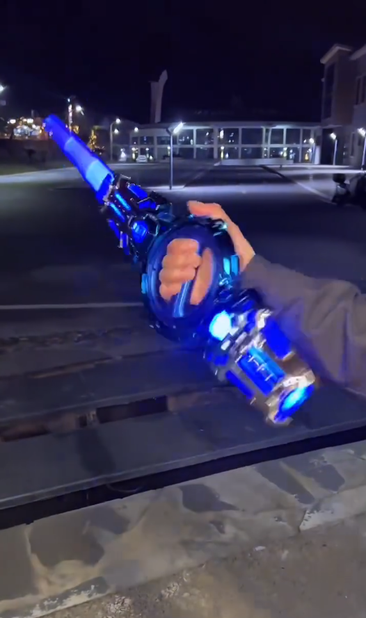Retractable Light‑Up Spinning Saber Toy with Sound Effects for Kids